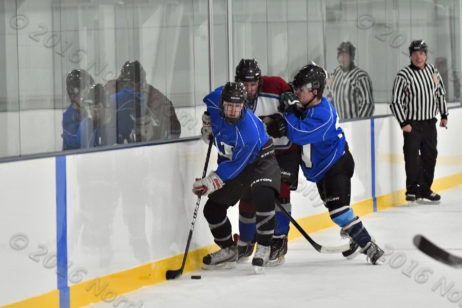 Wheaton College Men\'s Ice Hockey vs Middlesex Community College. - Photo By: KEITH NORDSTROM